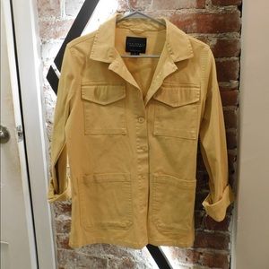 Yellow button down jacket